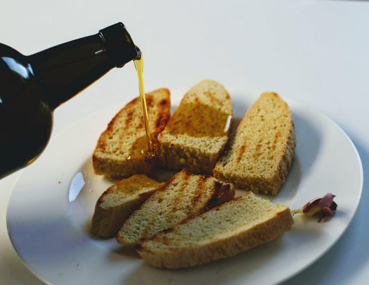 Lucaniae organic extra virgin olive oil stored in metal cans and bag-in-box, which protect the oil from light and air